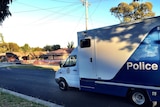 Police at the scene of a fire at Long Gully