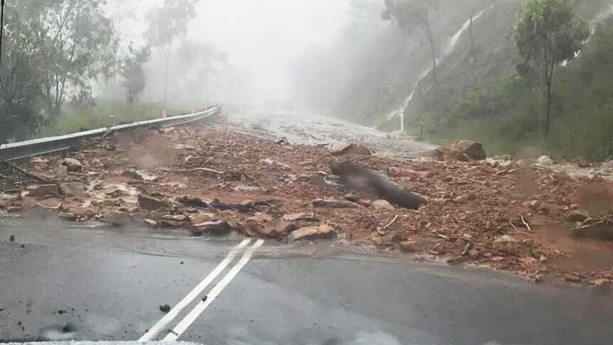 A landslide cuts the road at Hervey Range, west of Townsville in north Queensland