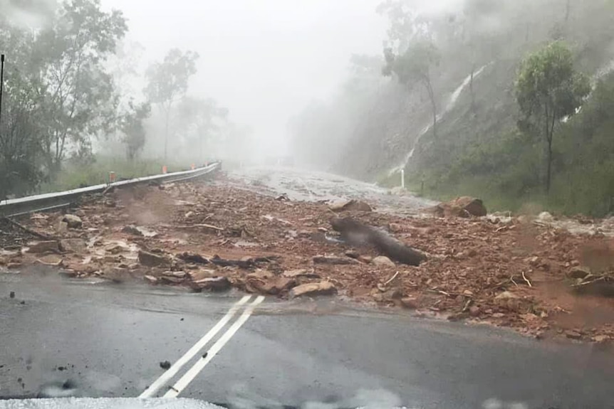 A landslide cuts the road at Hervey Range, west of Townsville in north Queensland