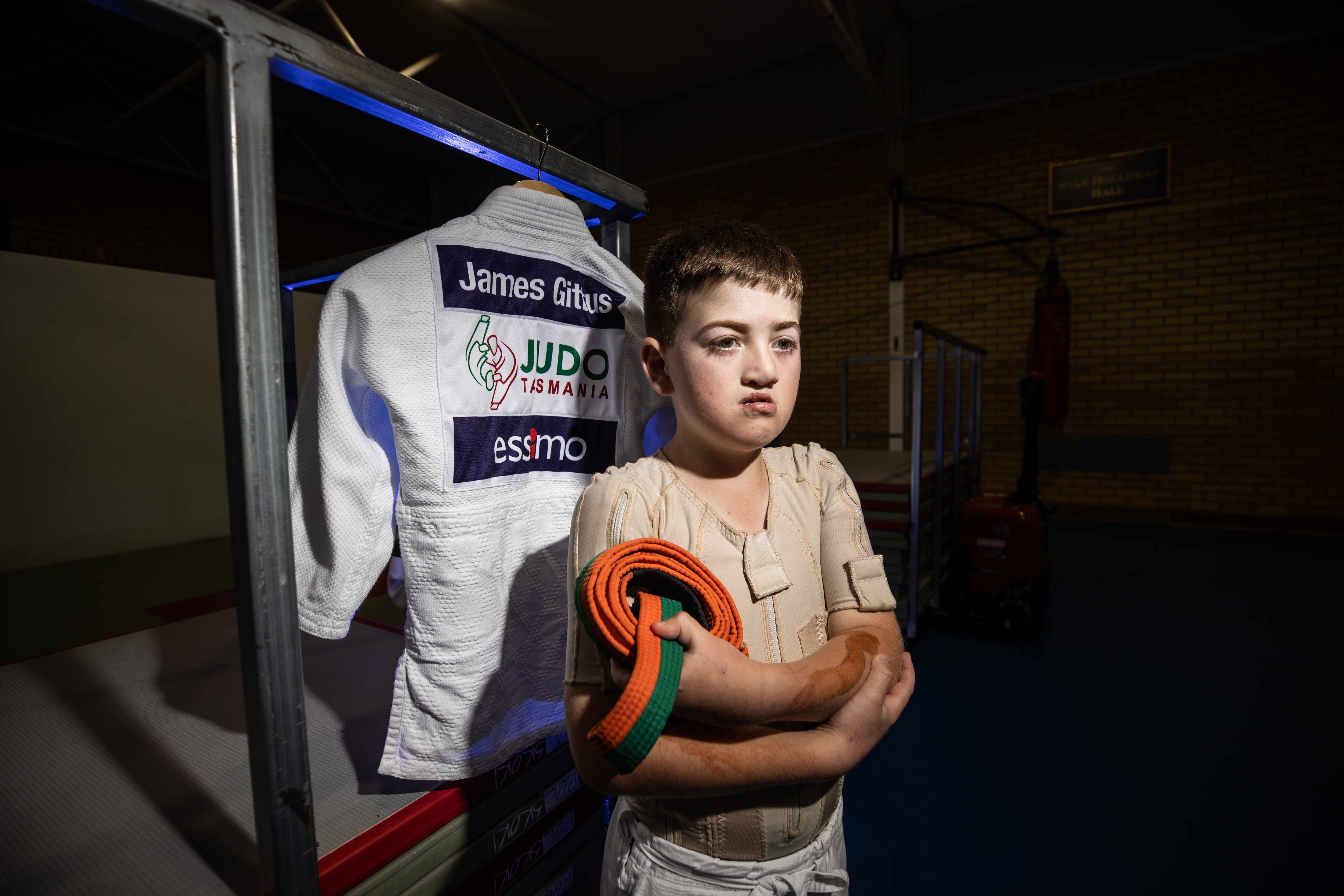 A young boy practicing judo.