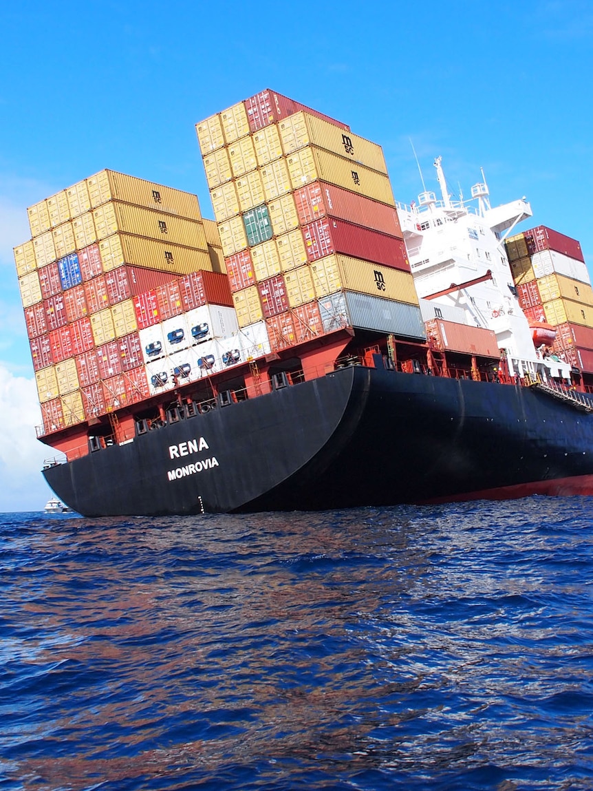 The 236 metre long Liberian registered cargo ship Rena is pictured caught on the Astrolabe Reef near Motiti Island