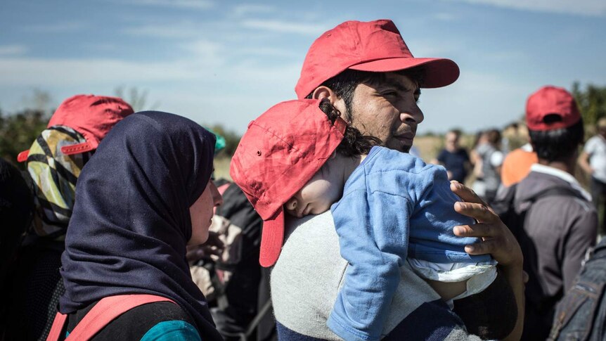 Asylum seeker with child in Croatia