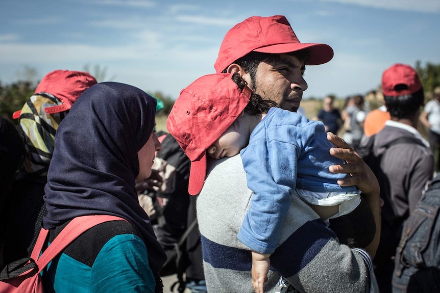 Asylum seeker with child in Croatia