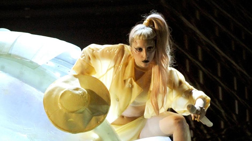 Lady Gaga emerges from an egg at the Grammys