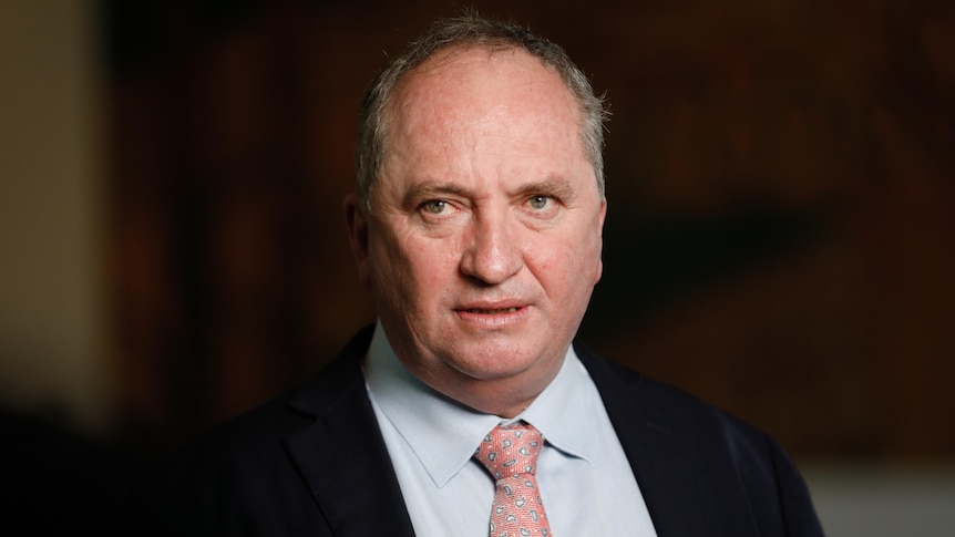 Barnaby Joyce looks serious as he stares at something out of frame.