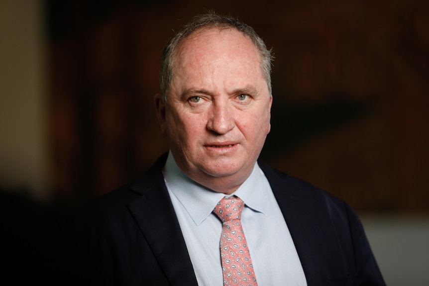 Barnaby Joyce looks serious as he stares at something out of frame.