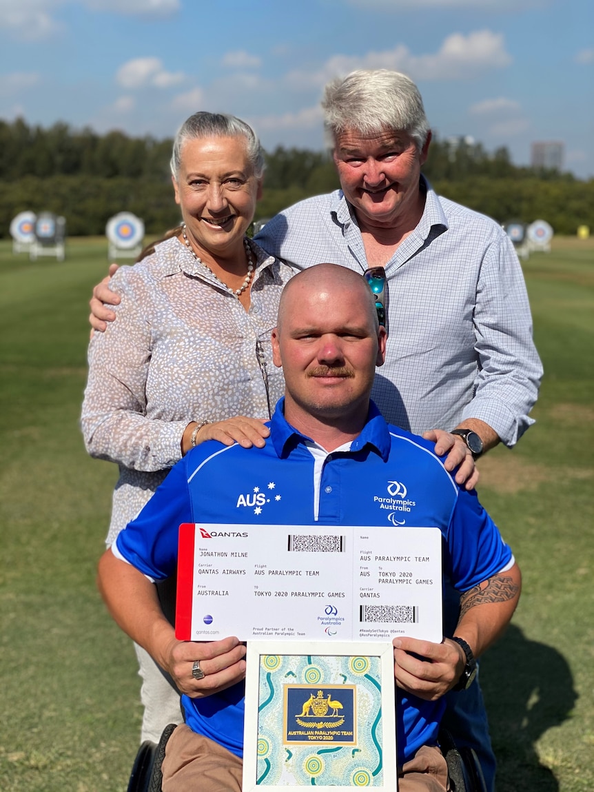 Man with his Paralympic ticket to Tokyo