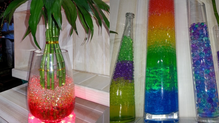 Vases filled with colourful water beads.