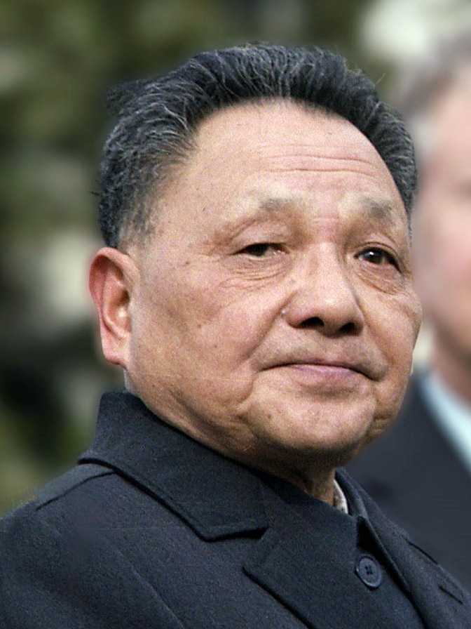 A close up photo of Deng Xiaoping in a dark coat