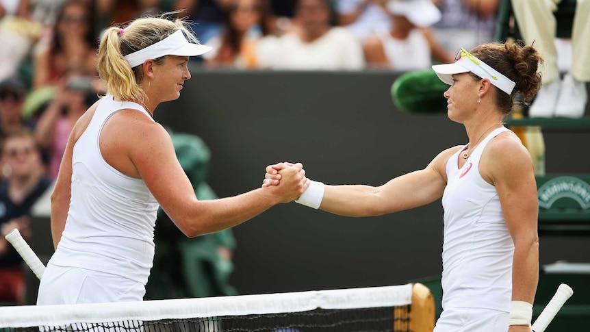 Humiliating loss ... Samantha Stosur (R) congratulates Coco Vandeweghe on her victory