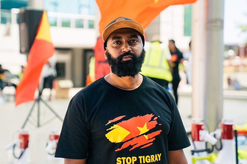 Perth protest organiser Araya Abera wearing a t-shirt in support of Tigray.