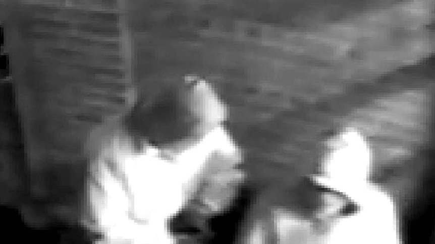 CCTV footage: the pair demanded cash from staff at Rydges Hotel.