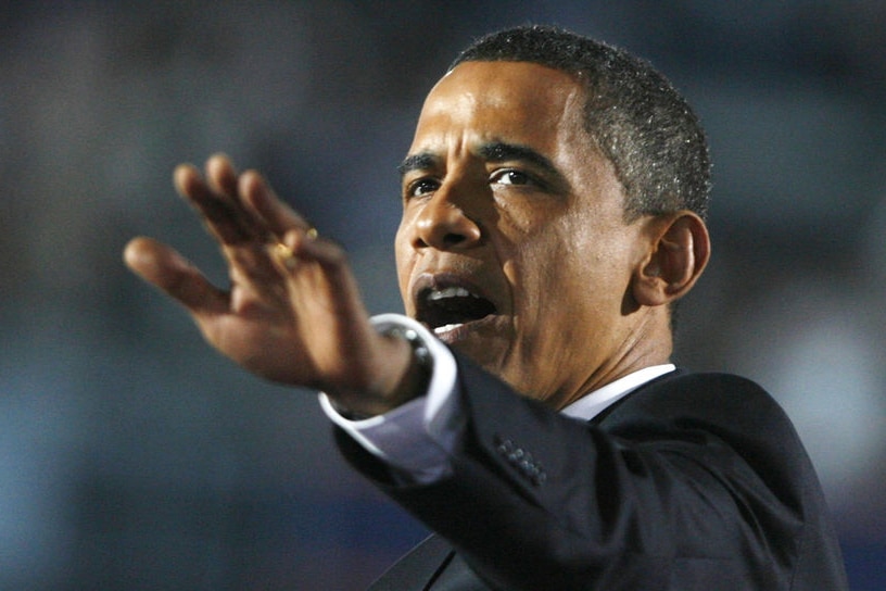 Obama gestures while giving acceptance speech