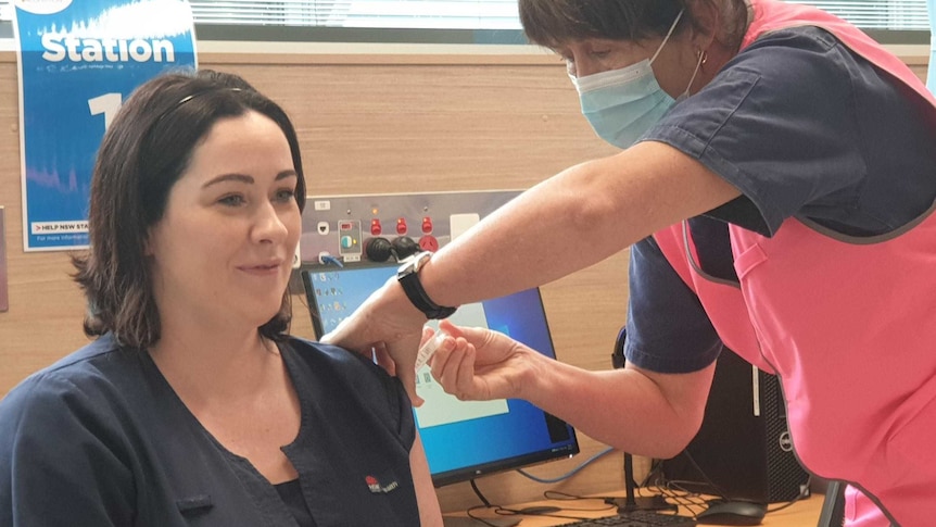 Nursing Unit Manager Clare Scullion receives the COVID-19 vaccination at Coffs Harbour Health Campus, 17.03.2021