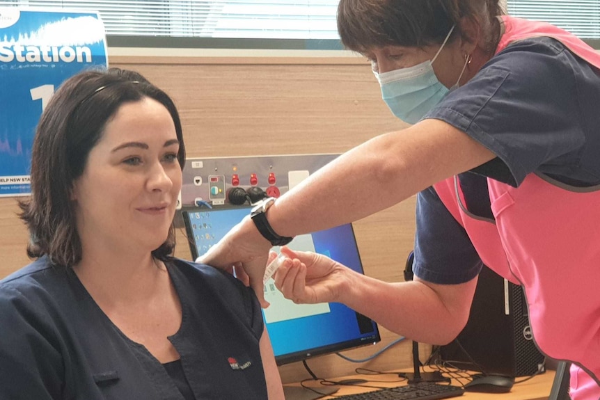 Nursing Unit Manager Clare Scullion receives the COVID-19 vaccination at Coffs Harbour Health Campus, 17.03.2021