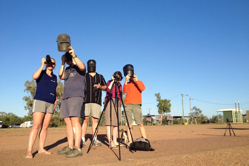 Eclipse-watchers in Longreach in central-west Qld on November 14, 2012.