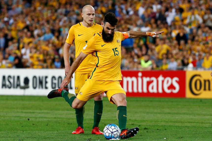 Socceroos' Mile Jedinak scores from a free kick against Honduras