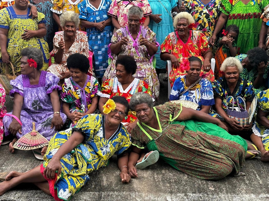 women of Vanuatu wear bright dresses.