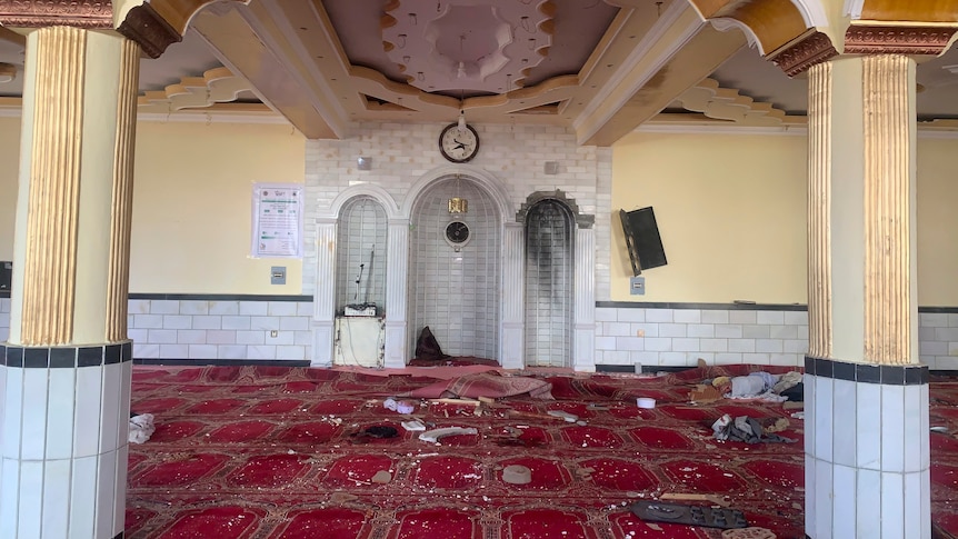 Debris inside a Kabul mosque after a blast