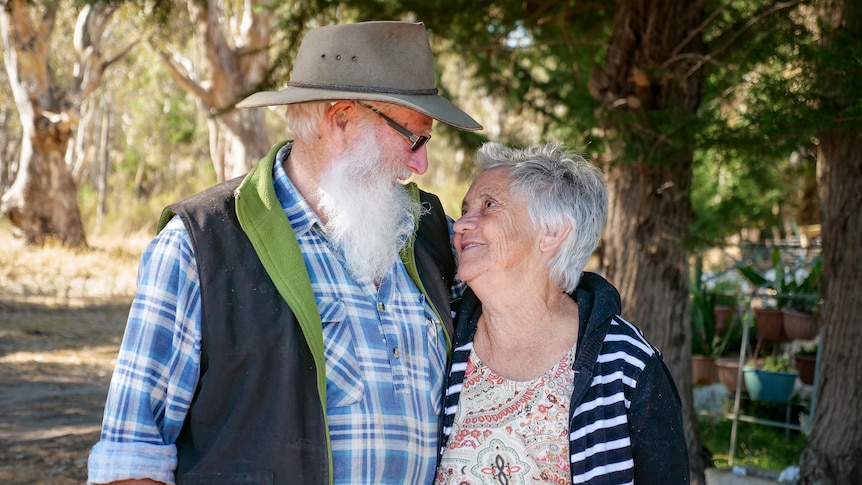 David and Shirley Morris look into each others eyes on their farm