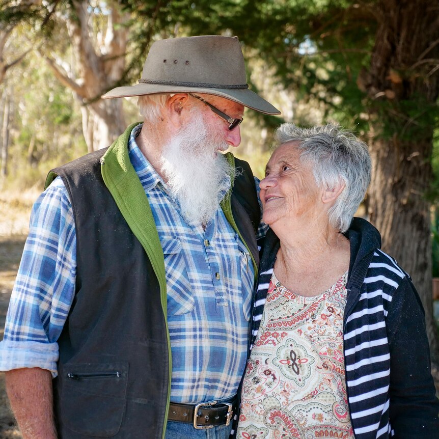 David and Shirley Morris look into each others eyes on their farm