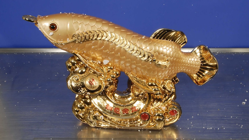 A golden fish statue.