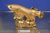 A golden fish statue.