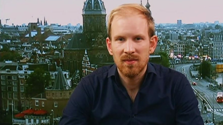 Rutger Bregman wears a blue shirt