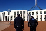 Police patrol at Parliament House in Canberra
