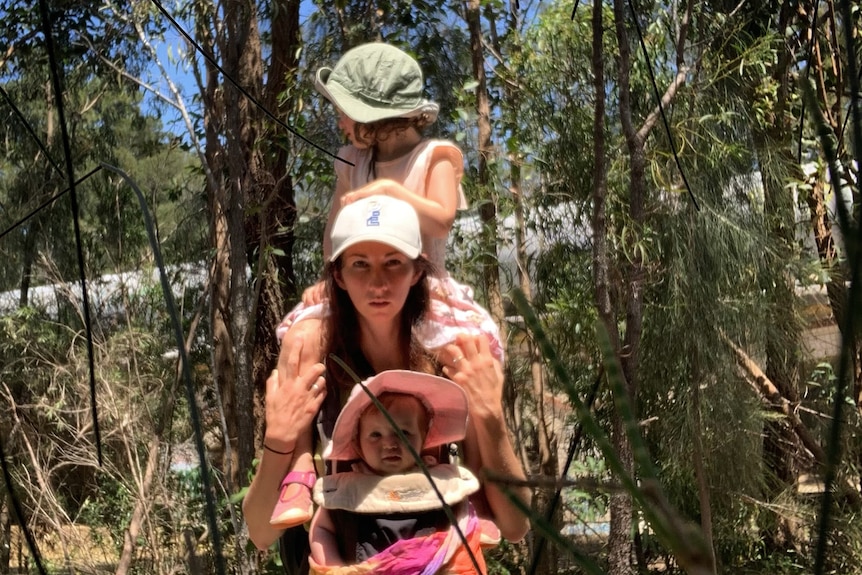 Veronica Milsom with her daughters after trying to go no nappy with yer youngest baby