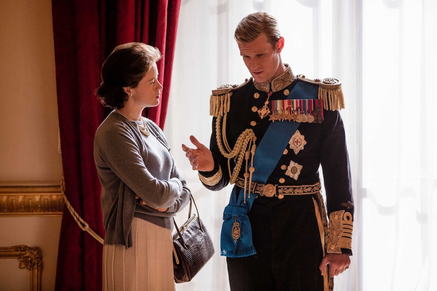 Queen Elizabeth (played by Claire Foy) and Prince Philip (played by Matt Smith) talk in The Crown.