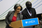Sahle-Work Zewde is in a large room and  holding a large box for work she did for United Nations Environment Assembly