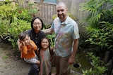 David Stuart and his family in their garden in Japan for a story about travelling the world as a family