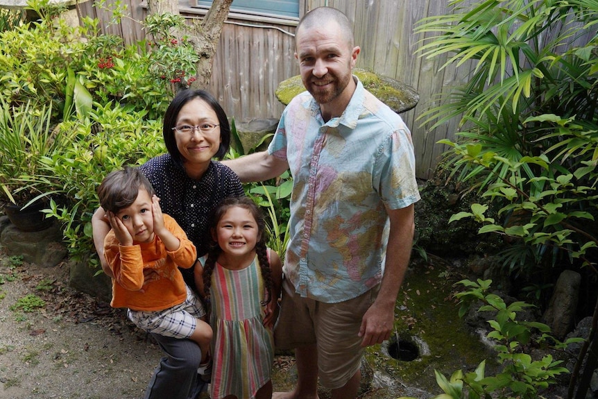 David Stuart and his family in their garden in Japan for a story about travelling the world as a family