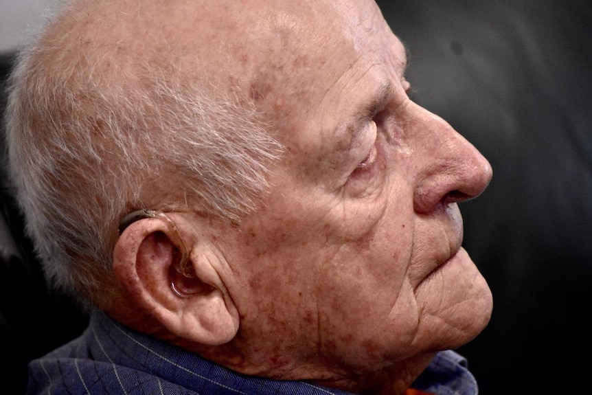 Close up photo of an elderly man's face from the right side.