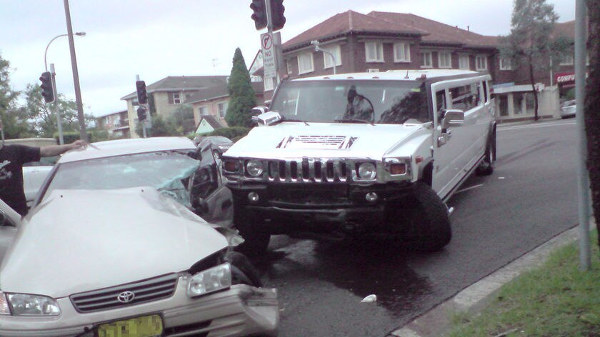 A limousine and a car rest on Spit Road after a accident in the northern Sydney suburb of Mosman, February 21, 2009. Seven people, including five children, were taken to hospital for the treatment of minor injuries after the crash.