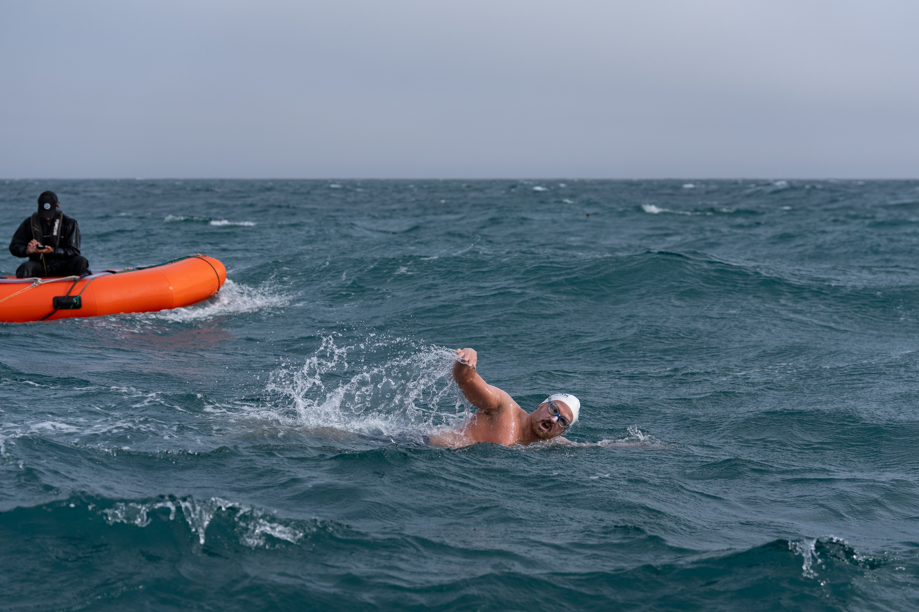 Jono Ridler swims in choppy seas