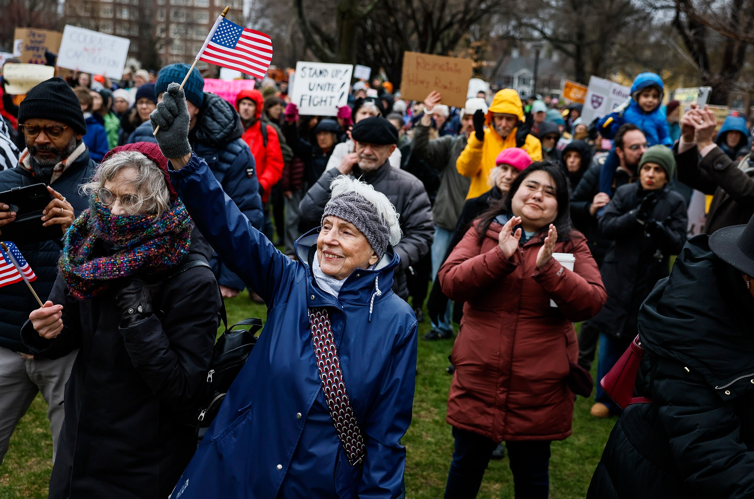 Hundreds of demonstrators gather on Cambridge Common during a rally
