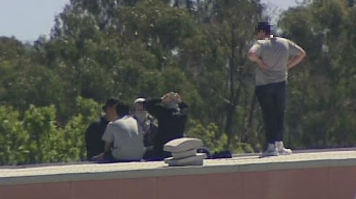 Inmates on the roof of the Malmsbury Youth Justice Centre.
