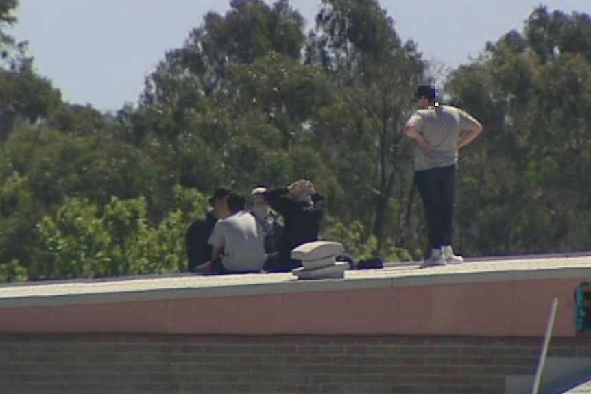 Inmates on the roof of the Malmsbury Youth Justice Centre.