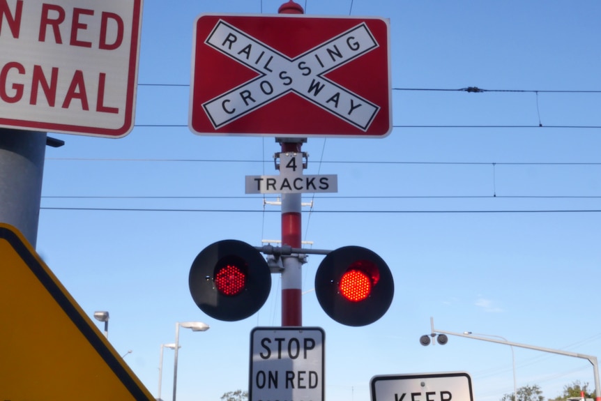 A railway crossing sign. 