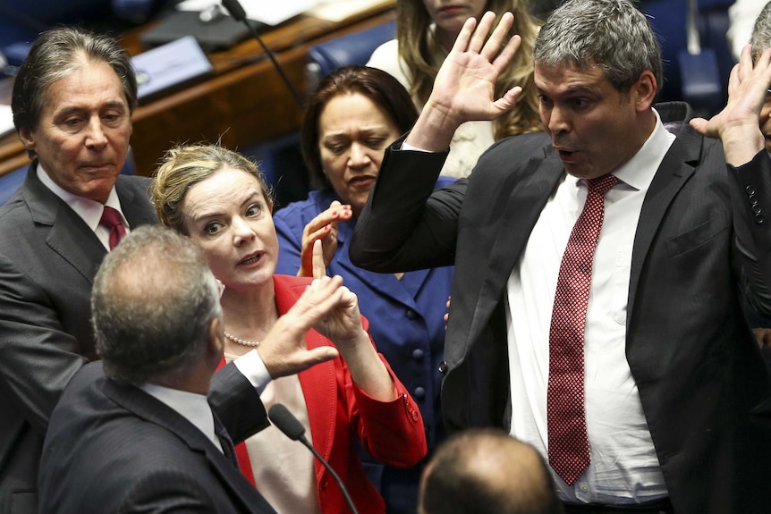 Visibly animated Senators argue during the second day Senate impeachment trial of Brazilian suspended President Dilma Rousseff