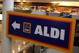 Sign points to Aldi discount supermarket