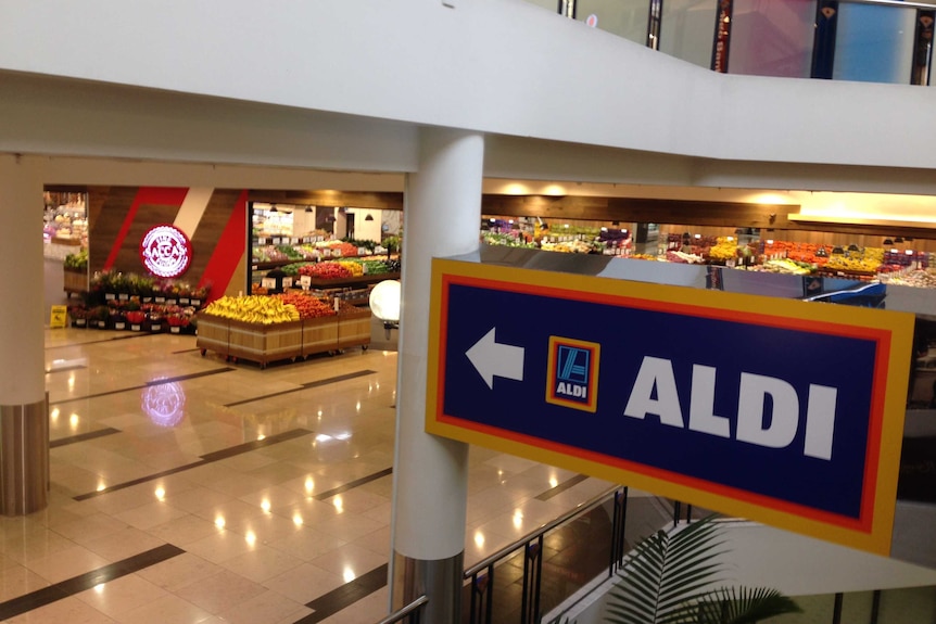 Sign points to Aldi discount supermarket