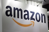 The Amazon logo is seen at the Young Entrepreneurs fair in Paris.
