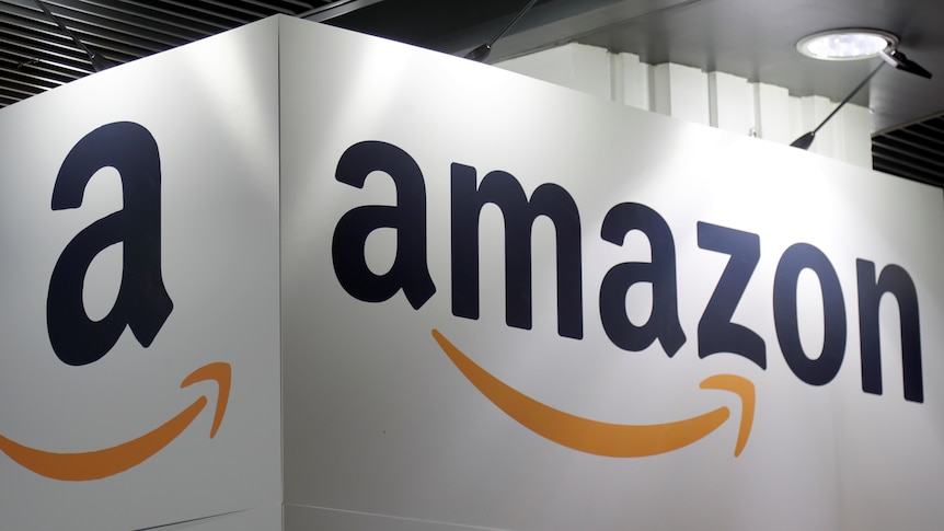 The Amazon logo is seen at the Young Entrepreneurs fair in Paris.