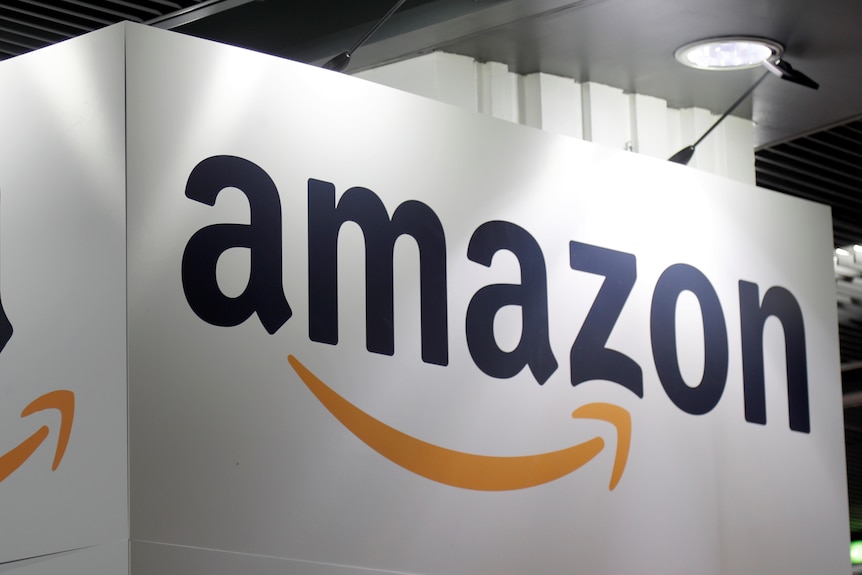 The Amazon logo is seen at the Young Entrepreneurs fair in Paris.