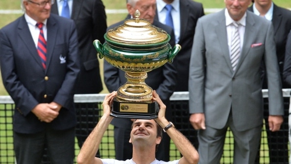 Roger Federer lifts Halle trophy