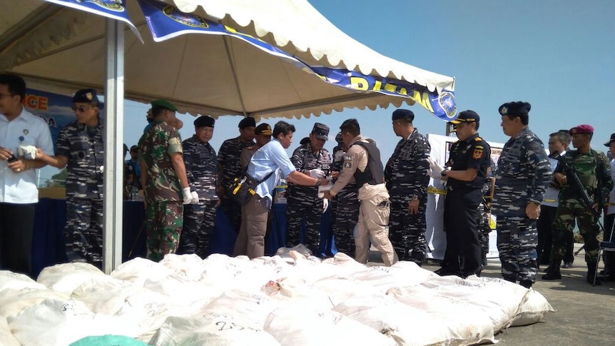 Indonesian Navy displays bags of the methamphetamines