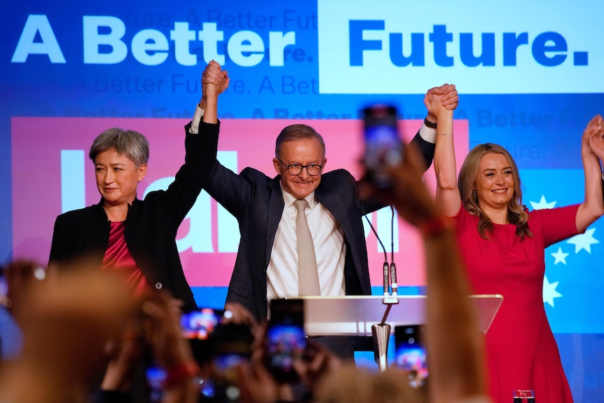 Anthony Albanese celebrates his election win with his partner partner Jodie Haydon and Labor senate leader partner Penny Wong.